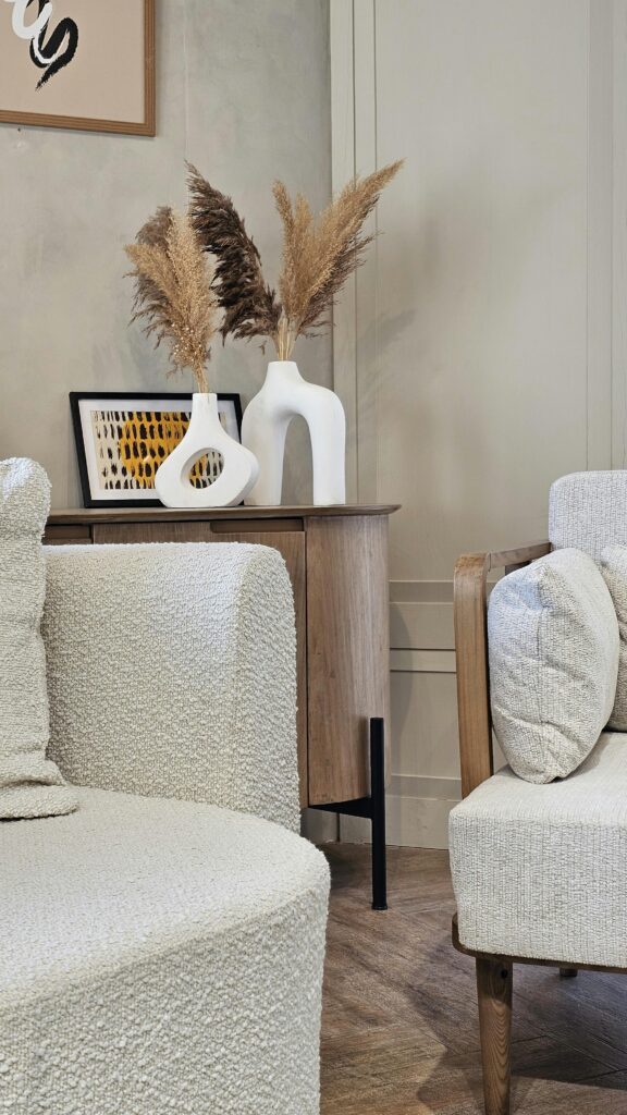 Neutral Living Room Ideas: 15 Warm and Layered Spaces neutral sofa styled with pampas grass and layered textures