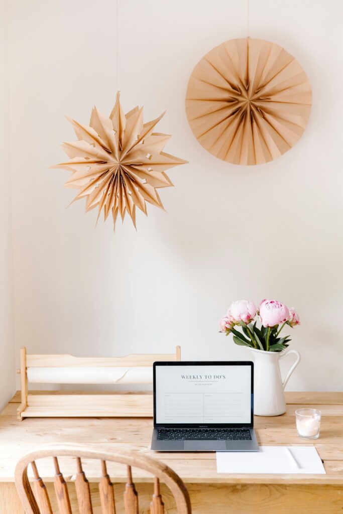 15 Neutral Office Decor Ideas That Feel Calm, Curated, and Intentional neutral office decor with warm wall accents above a light wood desk and minimal neutral styling